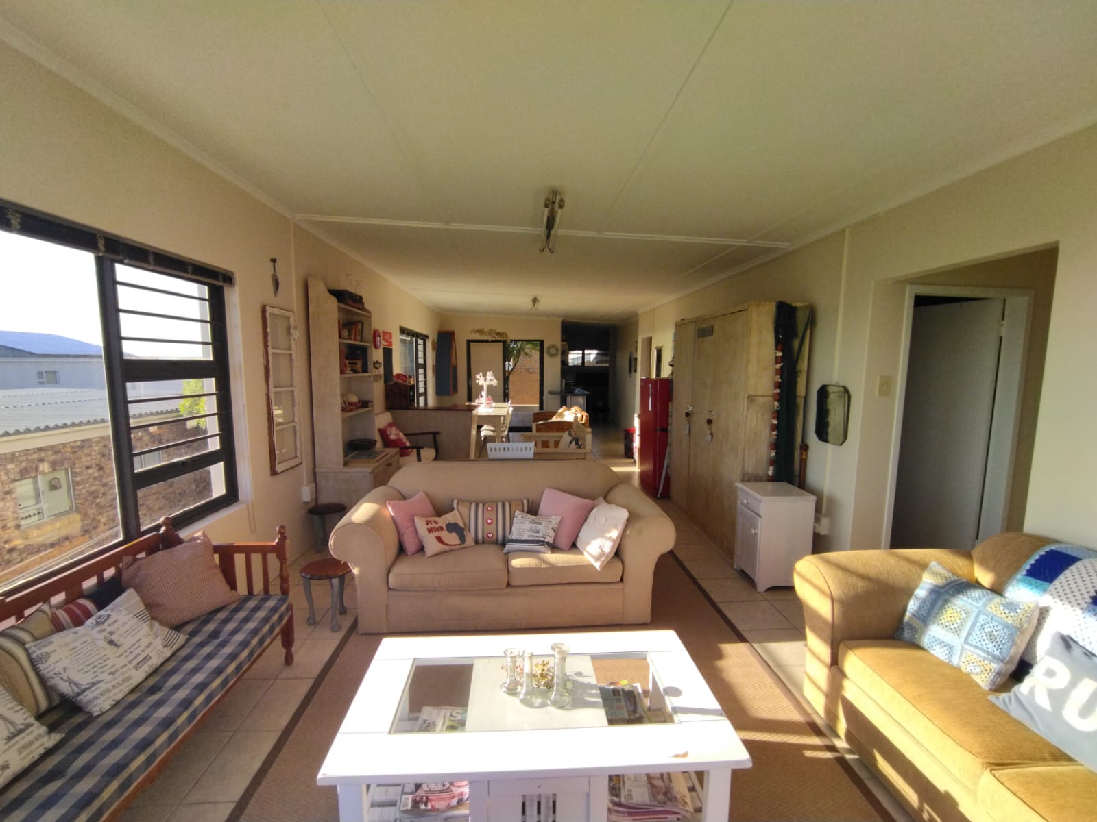 Heldersig accommodation exterior view with rugged sea cliffs in background